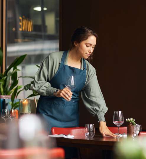 female-waitress-setting-tables-2023-11-27-05-13-23-utc-1.jpg
