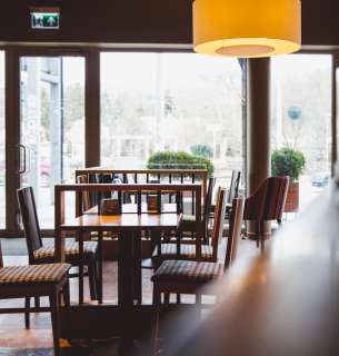 modern-cafe-interior-in-wooden-style-in-sunlight-2023-11-27-05-02-25-utc-1.jpg